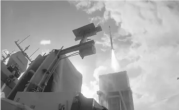  ??  ?? Photo shows the operationa­lisation of the Iron Dome missile intercepto­r system firing from navy ship Sa’ar 5-corvette INS Lahav. — Reuters photo