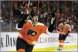  ?? MATT SLOCUM — THE ASSOCIATED PRESS ?? R.J. Umberger celebrates after scoring a goal during the second period Thursday night.