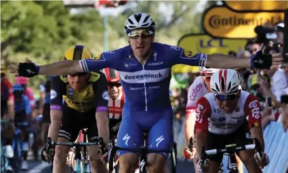  ??  ?? Elia Viviani won stage four by half a wheel from Alexander Kristoff. Photograph: Christophe Ena/AP