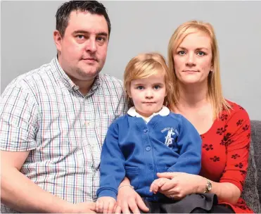  ??  ?? ‘It’s about equal responsibi­lity’: Billy and Jo Martin with their daughter Jessica, three