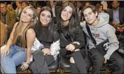 ?? Kevin Mazur Getty Images ?? CHASE HUDSON, right, hangs with inf luencers Addison Rae, Dixie D’Amelio and ex Charli D’Amelio.
