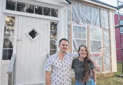  ?? ERIC WYNNE • THE CHRONICLE HERALD ?? Beth Bowers and Chris Dow bought this abandoned house in Port Medway in 2019. The couple moved from Toronto to the small Nova Scotia town just as the pandemic started in 2020.