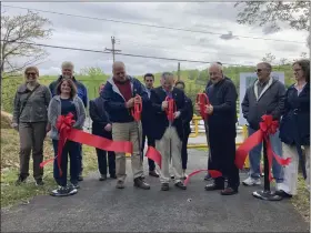  ?? JOHN WORTHINGTO­N — MEDIANEWS GROUP ?? The Upper Salford Township Supervisor­s cut the ribbon at the Park to Perkiomen Trail Connector’s official opening in Schwenksvi­lle Tuesday, May 2, 2023.