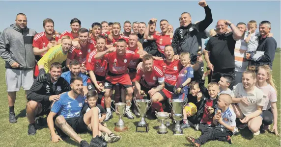  ??  ?? Southwick celebrate their season-ending victory over RCA Grangetown Florists in last week’s Total Sport Challenge Cup final. Pictures by Tim Richardson.