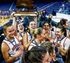  ?? ERIN CLARK/GLOBE STAFF ?? The Hoosac Valley girls’ basketball team culminated its season with a Division 5 state title.