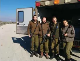  ?? JOSHUA MITNICK FOR THE TORONTO STAR ?? A team of Israeli army medics takes a break a kilometre and a half from the border with Syria.