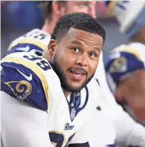  ?? MARK J. REBILAS/USA TODAY SPORTS ?? Rams defensive tackle Aaron Donald was one of a handful of big-name players who skipped mandatory minicamps, risking fines.
