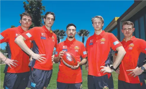  ?? Picture: CHRIS HYDE/GETTY IMAGES ?? READY TO PLAY: Caleb Graham (left) with Gold Coast Suns teammates Ben King, Izak Rankine, Jack Lukosius and Jez McLennan.