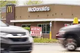  ?? KEITH SRAKOCIC/ASSOCIATED PRESS ?? A sign advertises a $500 hiring bonus outside a McDonald’s in Cranberry Township, Pa., on May 5. U.S. employers posted a record number of available jobs in March.
