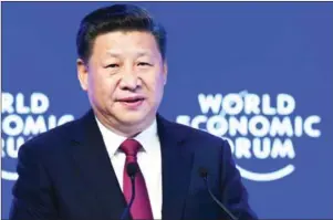  ?? FABRICE COFFRINI/AFP ?? China’s President Xi Jinping delivers a speech on the opening day of the World Economic Forum, on Tuesday, in Davos.