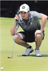  ?? CLIFFORD SKARSTEDT EXAMINER FILE PHOTO ?? Golfer
Derek Howse lines up his putt on the sixth green during the 35th annual Wes Dixon Memorial Golf Tournament at Pine Crest Golf and Country Club in Keene.