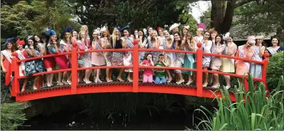  ??  ?? Roses enjoy a picture with Cliona and Cieran O’Connor from Dublin in the Japanese Gardens , Co Kildare on there way to Kerry for the Rose of Tralee Festival. Photo By Domnick Wals