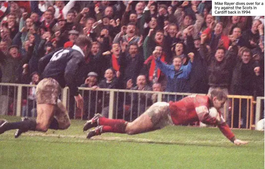  ??  ?? Mike Rayer dives over for a try against the Scots in Cardiff back in 1994