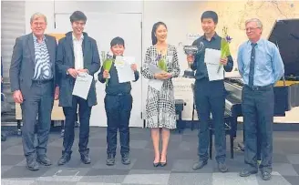  ?? Photo / Supplied ?? Former mayor Jim Mylchreest (left), Fergus Byett, Hao Tian Peter Hu, Fiona Yoo, Alex Liu, Brendan Hand (Lions president).