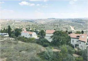  ?? (Udi Shaham) ?? A VIEW of Har Adar, with the Palestinia­n village Beit Surik in the background.