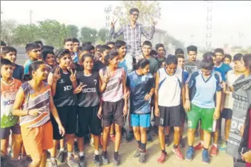  ?? HT PHOTO ?? ■ Naveen, who scored 491 marks out of 500, celebratin­g his success with friends and classmates after the declaratio­n of board results, in Hisar on Thursday.