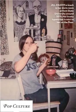  ??  ?? Pop Culture JILL ENJOYS a snack in her dorm room
at Kent State University around
1970. Her trusty typewriter is next to
her on the floor.