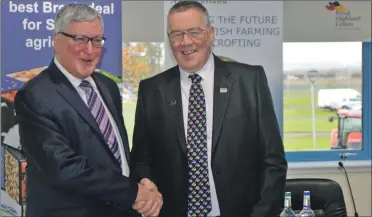  ??  ?? NFU Scotland President Andrew McCornick, right, shares a handshake with Rural Economy Secretary Fergus Ewing.