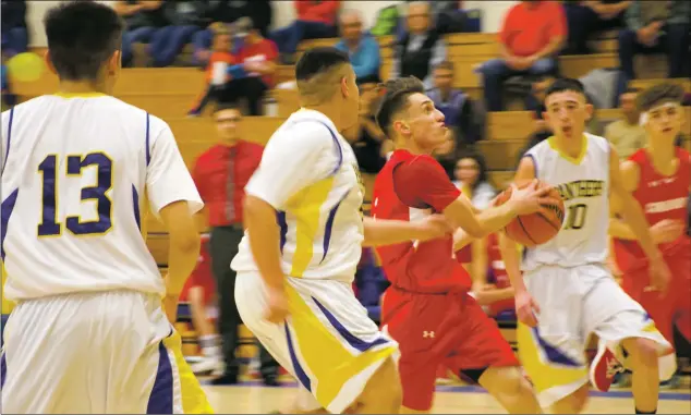  ?? Sheila Miller/The Taos News ?? The Peñasco Panthers defend against a breakaway by Cimarron’s Morgan Sahd.