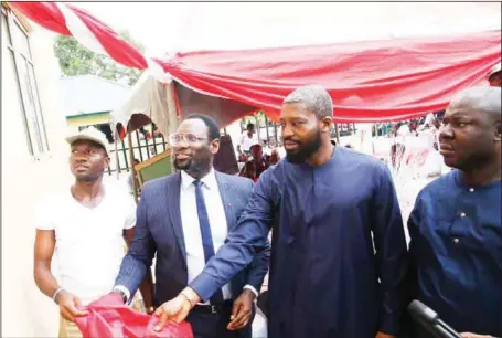  ??  ?? L-R: NYSC Representa­tive; Stakeholde­r Management and Community Developmen­t Division Manager NAOC, Mr. Dennis Masi; General Manager, External Relations, Oando Energy Resources, Mr. Kofo Tunji-Olagunju; and Tuomo Community Developmen­t Committee Chairman,...