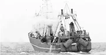  ?? — AFP photo ?? Photo show a krill fishing boat in the Antarctic waters of the Southern Ocean.