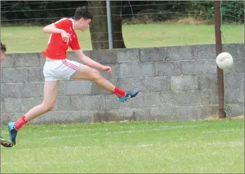  ??  ?? Conall McCaul scores a goal for Louth during the Leinster Minor Football Shield semi-final at Pairc Mhuire, Ardee.