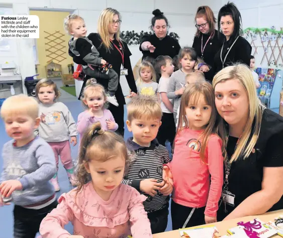  ??  ?? Furious Lesley McBride and staff with the children who had their equipment stolen in the raid