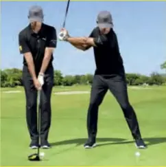  ??  ?? SAY GOODBYE TO THE REVERSE PIVOTThe power Brooks and DJ generate comes from loading the backswing, or coiling into their right side. You can’t unwind if you don’t wind up. Most golfers stay static and never make any kind of turn. This drill encourages dynamic movement and stops a reverse pivot. Standing with your feet close together, step back with your trail leg as you take your backswing. With your weight planted in your right instep, the transition into the downswing will naturally engage the core and drive that weight towards the target, unloading all the power that you’ve stored.