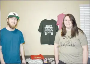  ?? RACHEL DICKERSON/MCDONALD COUNTY PRESS ?? Kyle King and Brittany Sweeten are owners of K-9 Adventures Co., an Etsy shop that sells T-shirts, phone cases, waterproof stickers and more.