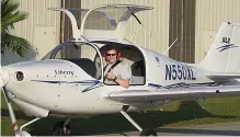  ??  ?? EXPERIENCE Jamie in the cockpit of a plane during his training