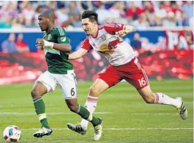  ?? STEVE LUCIANO/ASSOCIATED PRESS ?? New York Red Bulls midfielder Sacha Kljestan, right, leads MLS in assists. He is enjoying the All-Star experience. “To be in training with some of the best players in the world and the best players in our league, it’s a pretty cool experience,” he said.