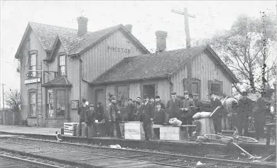 ?? CITY OF CAMBRIDGE ARCHIVES ?? For a century, this was a common sight at Preston’s Grand Trunk. Canadian National station on Dolph Street. In this circa 1910 scene, more than a dozen Prestonian­s are waiting for the train but only the dog is watching for the engine.