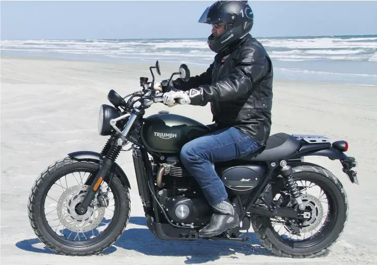  ?? CHRIS ELLIS/DRIVING.CA ?? Lighter with a lowered seat height, the Scrambler is an easy-to-ride big twin motorcycle that can handle gravel roads better than a regular street bike.