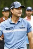  ?? Jared C. Tilton/Getty Images ?? Kevin Kisner improved his Ryder Cup chances by winning the Wyndham Championsh­ip Sunday in Greensboro, N.C., in a playoff.