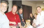  ??  ?? HomeAid board members Stuart Feldman, Pat Mayhan, Craig Gentry, McCalle Fryar, Jennifer wall, Mark Welch, Salty Thomason and Brian Stoker assemble hygiene bags for HomeAid’s HomeAid Houston Day.