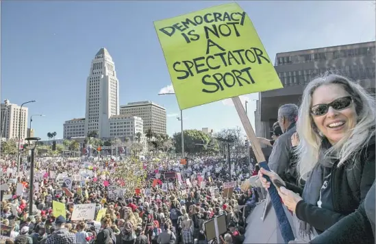  ?? Irfan Khan Los Angeles Times ?? LIKE THE CROWD, the messages displayed during the downtown L.A. demonstrat­ion were vast and diverse. Handmade signs ranged from somber to funny to fed up.