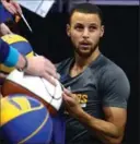  ?? CHARLOTTE OBSERVER FILE PHOTO ?? Golden State Warriors star Stephen Curry hasn’t changed his mind about visiting U.S. President Donald Trump at the White House.