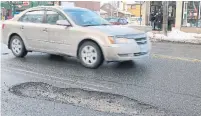  ?? JACK LAKEY ?? As of Thursday, the city has filled 16,028 potholes, about one-third less than were filled during the same period last year.