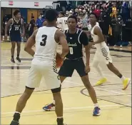  ?? KEV HUNTER/MEDIA NEWS GROUP ?? Cheltenham’s Elias Walker (left) is guarded by PW’s Zende Hubbard during their game on Friday.