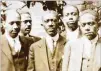  ?? CONTRIBUTE­D ?? Ex-Hogansvill­e Postmaster Isaiah Lofton (center), seen with his four sons, got Klan threats and faced an assassinat­ion attempt. He later moved to Washington, D.C.