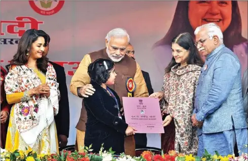  ?? AFP ?? Indian Prime Minister, Narendra Modi (centre). It is important that the government has sought changes in the MTP Act which purport for Indian women and girls greater autonomy and control over their lives and reproducti­ve choices.