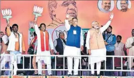  ?? PTI ?? PM Narendra Modi (right) and Chhattisga­rh CM Raman Singh during a rally in Bastar on Friday.