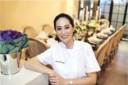  ??  ?? Ana Asis, the woman behind Test Kitchen's fine gustatory creations Sticky Rice with Mango