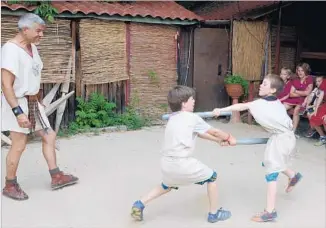  ?? Brian E. Clark ?? ANCIENT COMBAT is taught — safely — at the Historic Group of Rome’s gladiator school.