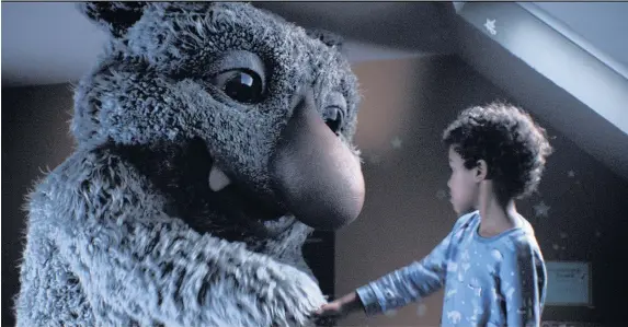  ??  ?? > This year’s John Lewis Christmas advert features a young boy and his imaginary monster under the bed