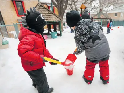  ?? JOHN MAHONEY ?? Children play in the snow at a CPE daycare in downtown Montreal on Tuesday. The Associatio­n québécoise des centres de la petite enfances set up an independen­t commission that makes a strong case for a complete revamp when it comes to the education of babies and toddlers.