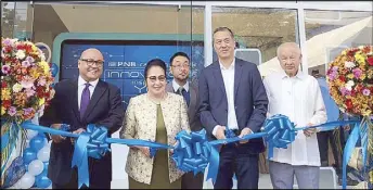 ??  ?? Photo shows (from left) PNB president Wick Veloso, San Juan City Mayor Guia Gomez, PNB Savings Bank president Jovencio Hernandez and PNB Savings Bank directors Michael Tan and Gregorio Hong during the ribbon-cutting ceremony last Nov. 27.