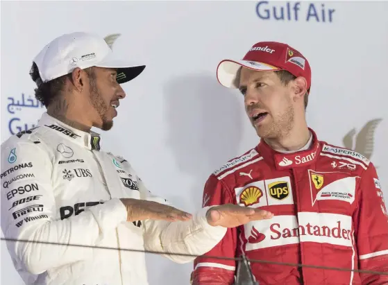  ?? FOTO: EPA/VALDRIN XHEMAJ ?? ETTA OCH TVåA. Lewis Hamilton var snabbast i tidskvalet i Spanien före Sebastian Vettel.