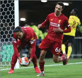  ??  ?? Virgil Van Dijk collects the ball after Watford score at Vicarage Road