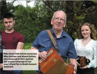  ??  ?? Mike Dowd with fellow musicians Mike Kelliher and Niamh Daltan, who featured in TG4’s behindthe-scenes coverage of last year’s Puck Fair in Beidh Aonach Amárach.